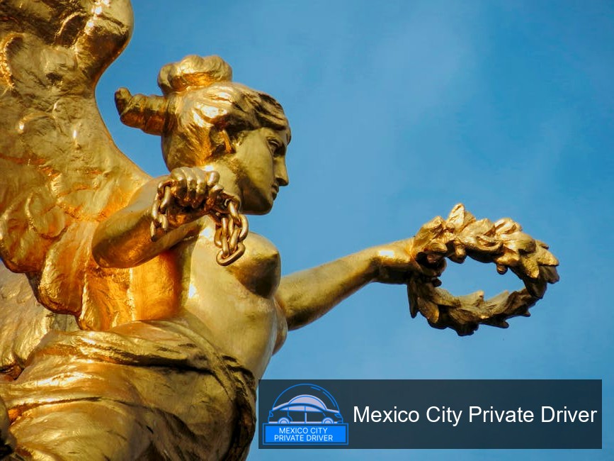 Detailed view of the sculptures depicting historical figures at Ángel de la Independencia in Mexico City.
