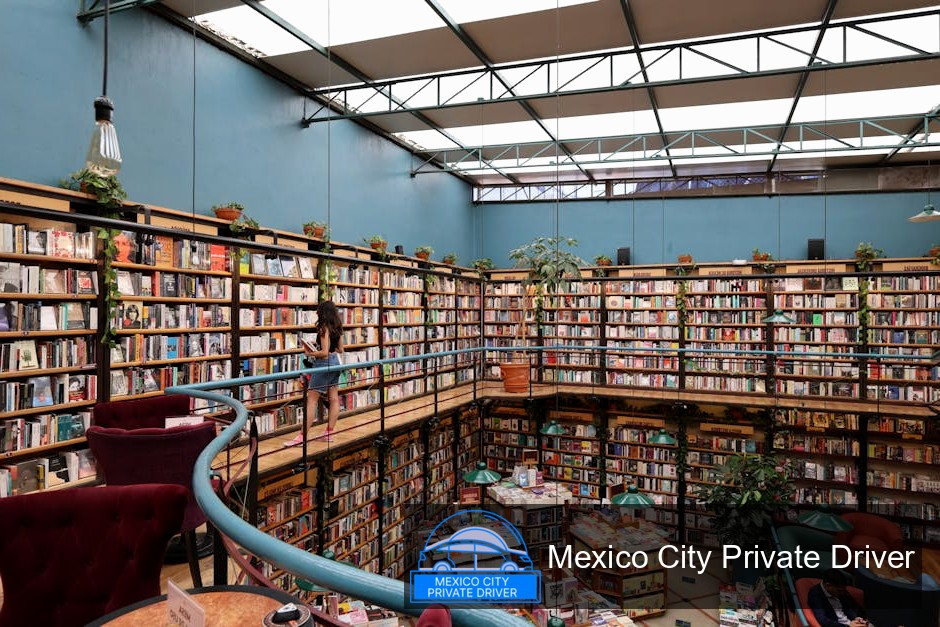 A warm, inviting reading corner filled with books and coffee at Cafebrería El Péndulo in Mexico City.