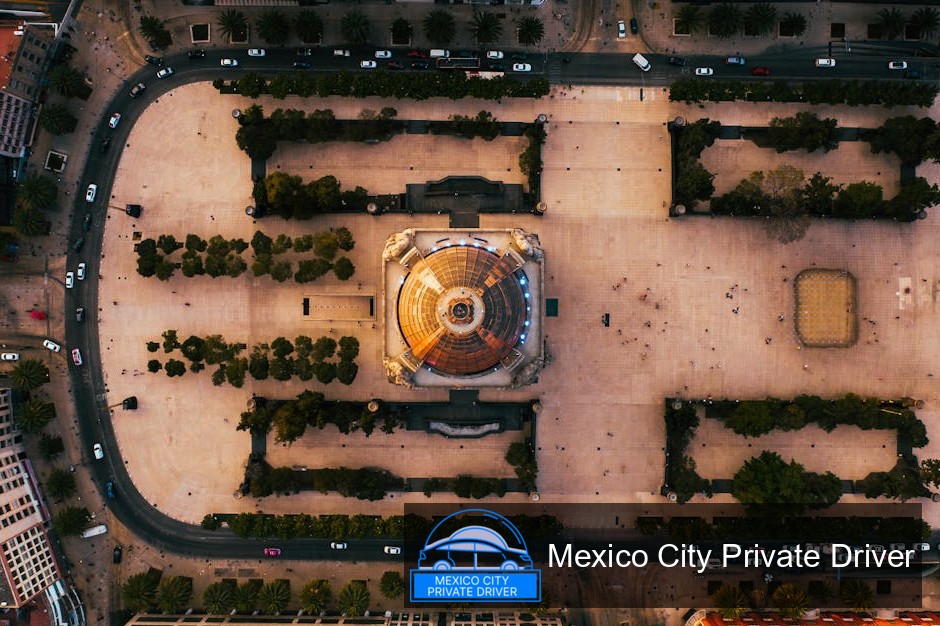 The impressive dome of Monumento a la Revolución surrounded by historical buildings in Mexico City.