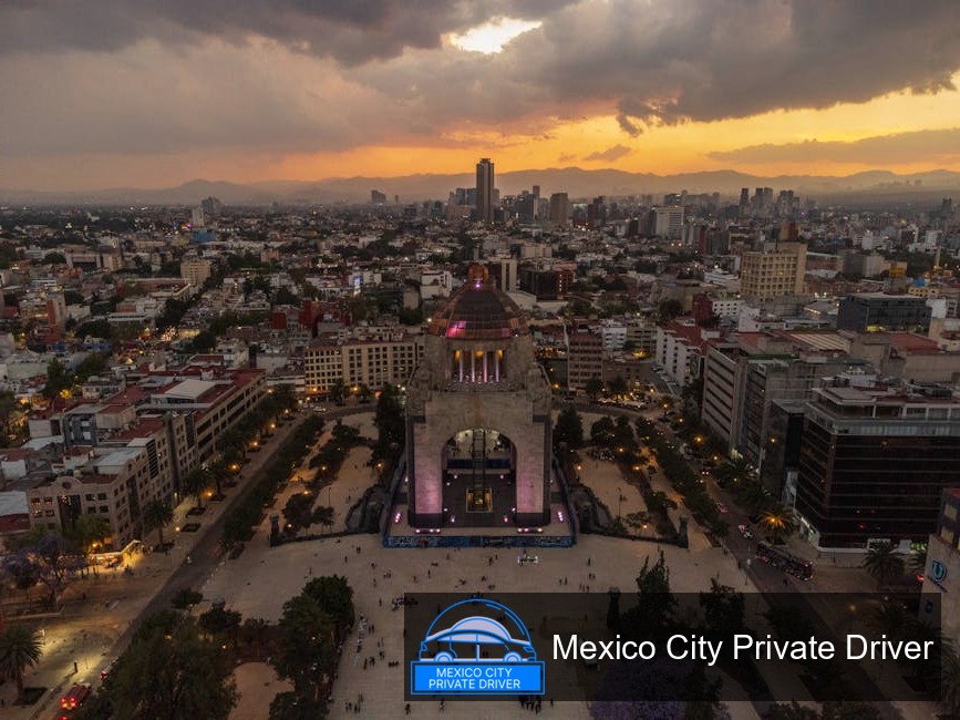 The towering Monumento a la Revolución surrounded by lush greenery and bustling streets in Mexico City.