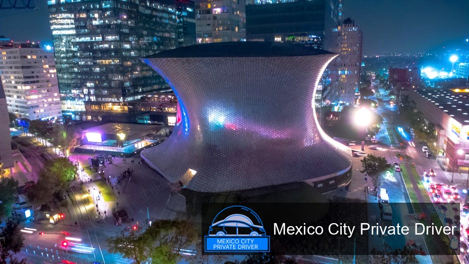 The spacious interior of Museo Soumaya with various art pieces displayed in a modern setting.